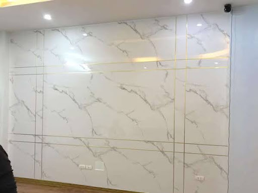 Tường cũ được “thay áo mới” với tấm ốp PVC vân đá VHOME